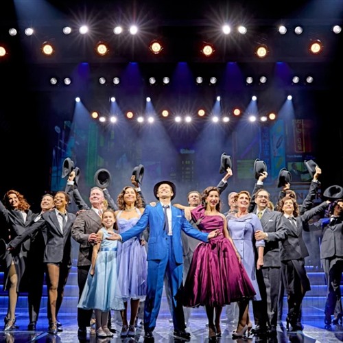 a photo of the performs at sinatra standing together 